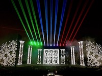 This photograph was shot at Arena Di Verona, where we supplied the lasers and SFX for a a stunning operatic night with singer Andrea Bocelli. The lasers lit up the elegant set, designed by Gioforma's Claudio Santucci. 